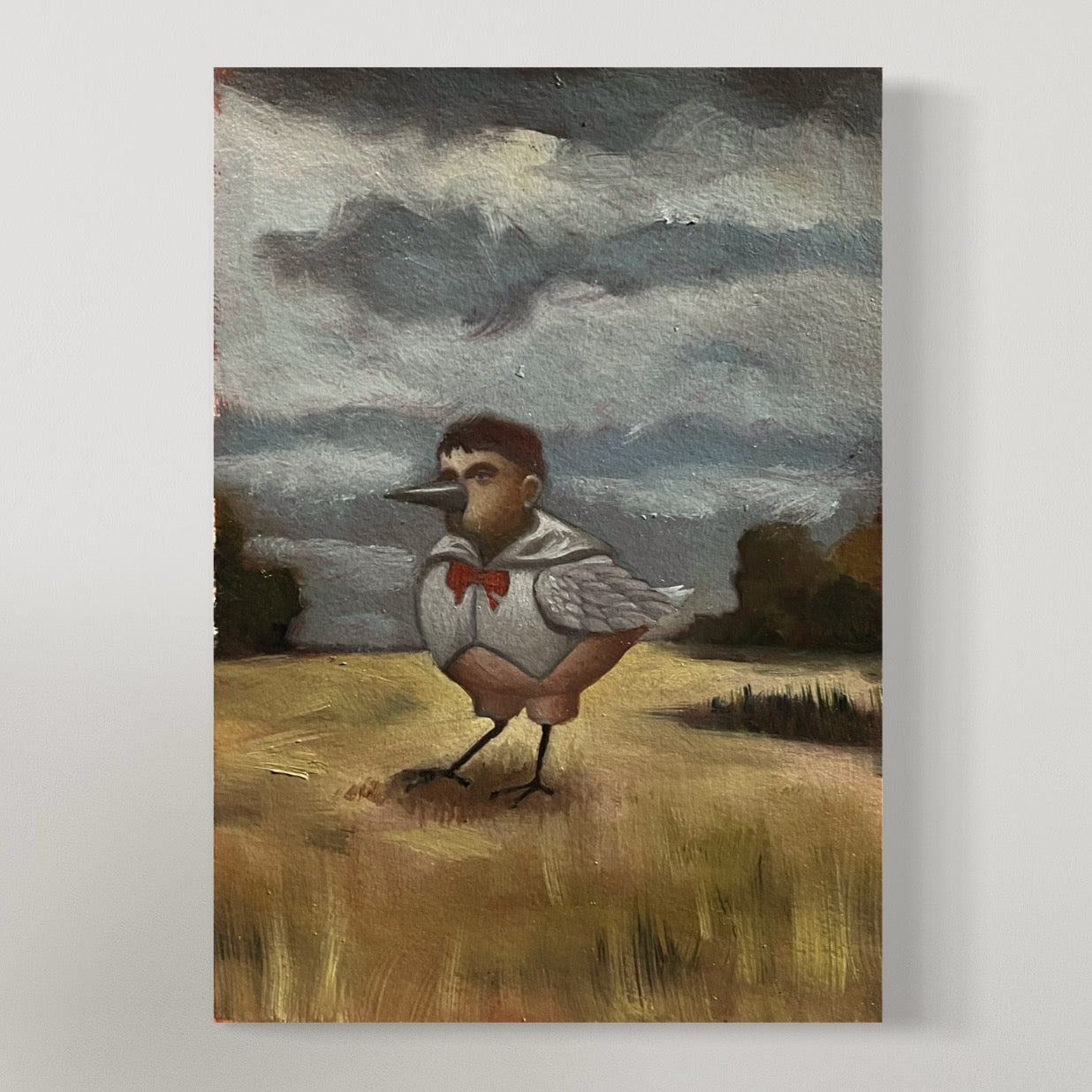 Oil painting of a small bird with a human-like face and red bow tie standing in a field under a cloudy sky.
